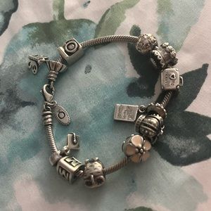 Pandora sterling silver charm bracelet with charms